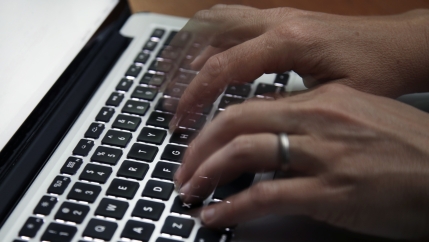 Fingers on a keyboard